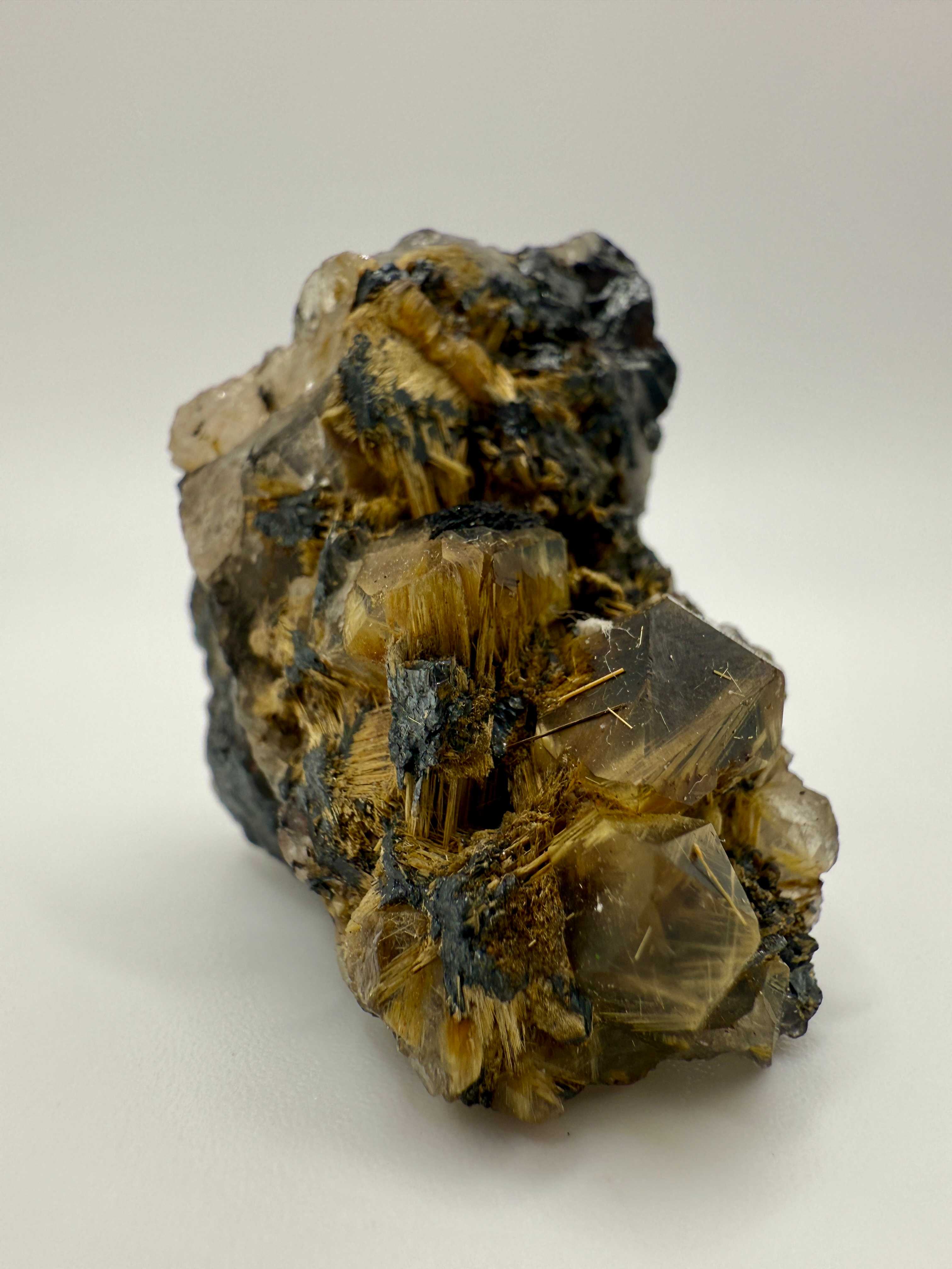 Golden Rutile on Hematite